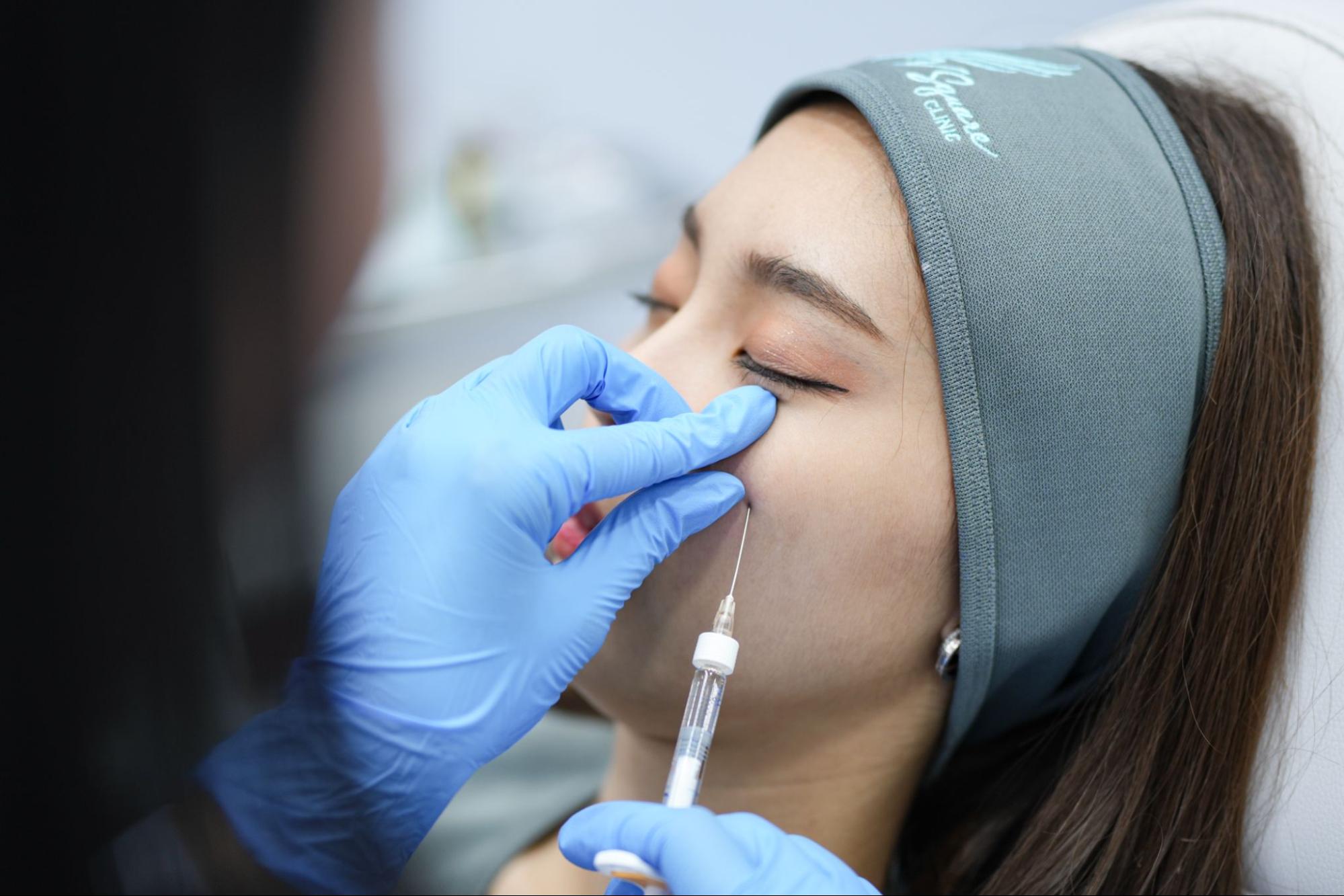 Under-eye filler with an experienced doctor